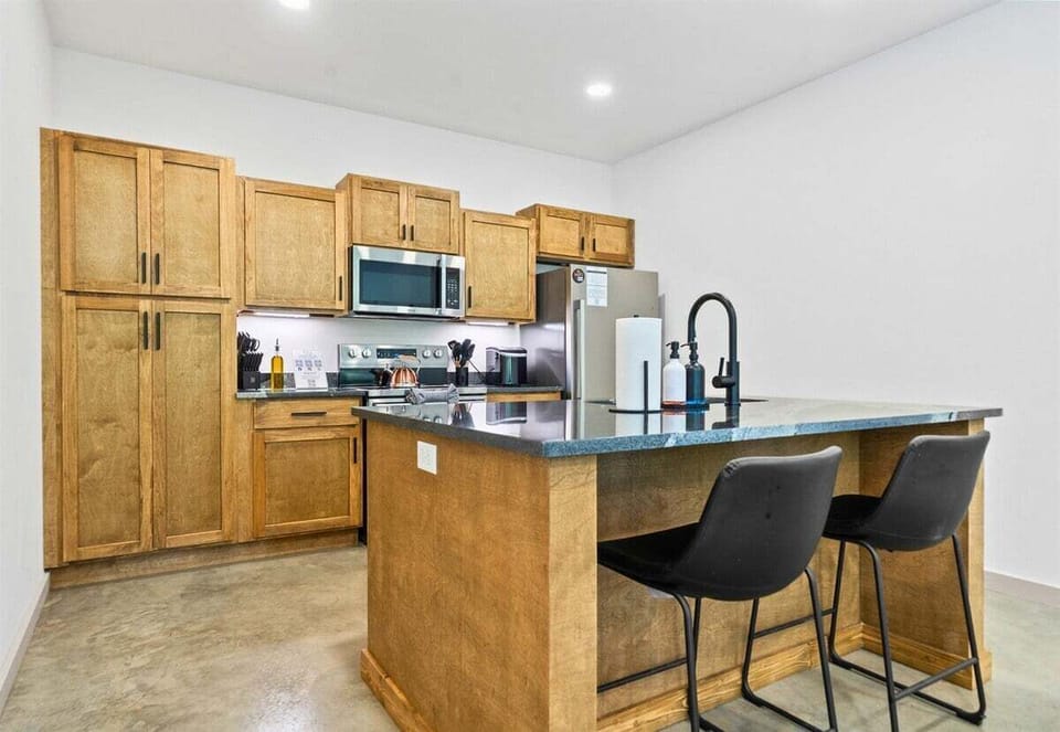 Open-concept kitchen with lots of space to gather, cook, and feel right at home.