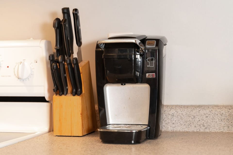 Keurig coffee maker for quick, convenient brewing—perfect for easy mornings before heading to the beach in Pine Knoll Shores, near Emerald Isle and Atlantic Beach.