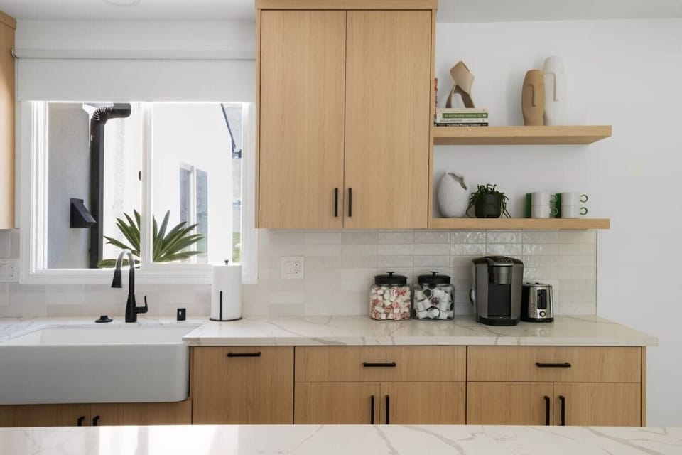 Bright and stylish kitchen with a coffee station, modern finishes, and everything you need to start your day.