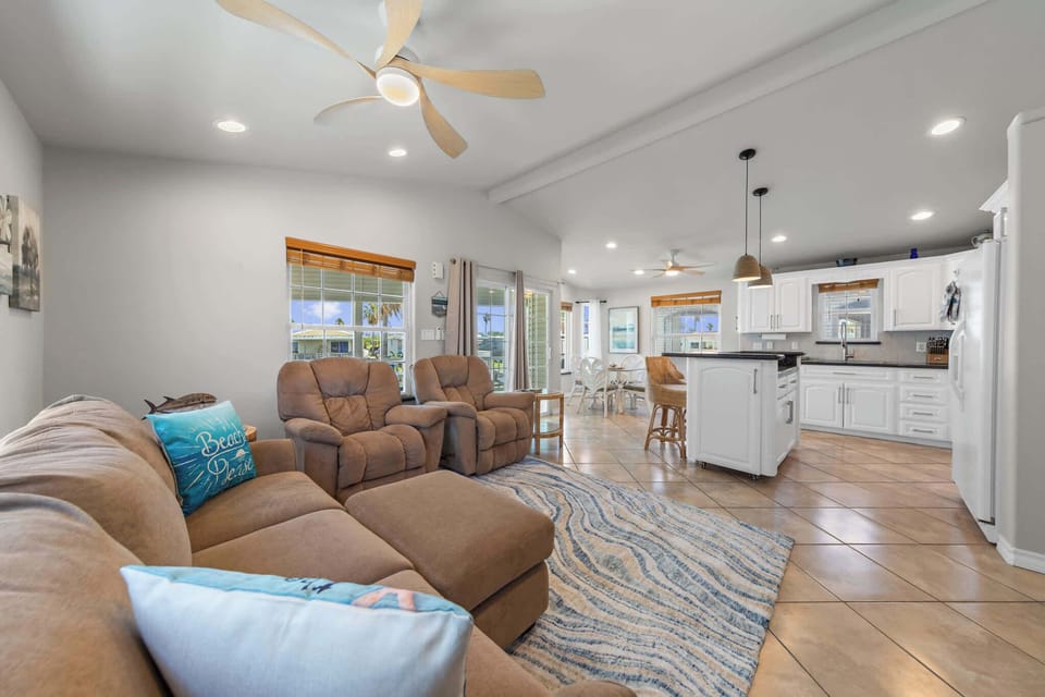 Gather the group in the bright open living room