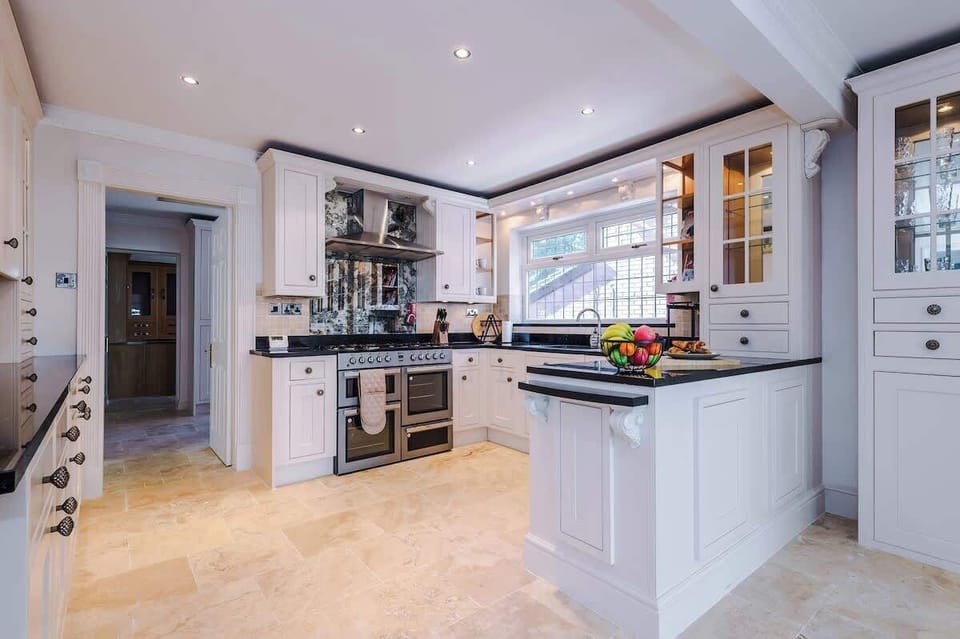 A beautifully designed kitchen with high-end appliances, granite countertops, and plenty of workspace — perfect for cooking and entertaining.