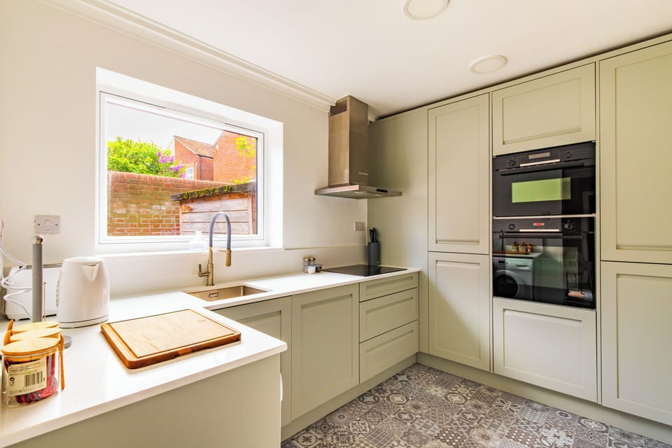 Kitchen with dishwasher, washing machine, microwave oven, and fridge freezer. All crockery and utensils provided. 