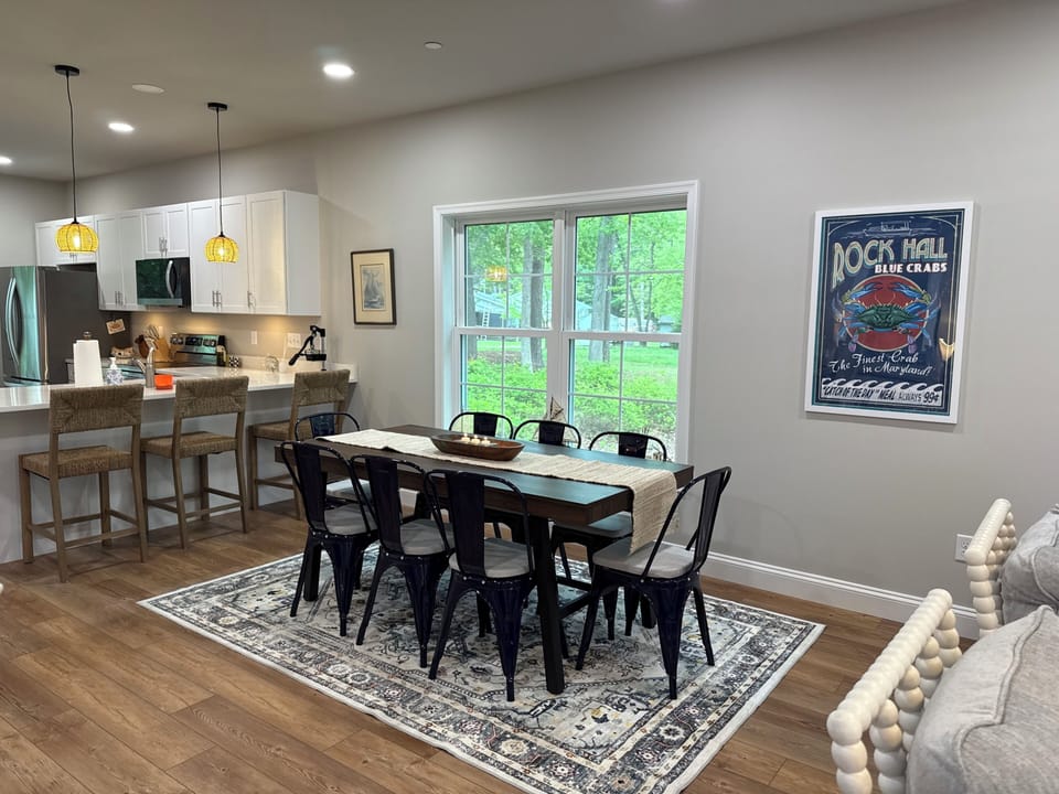 Dining room features seating for 8 at the table.