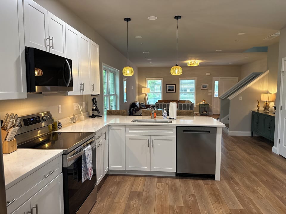 Kitchen is equiped with all your cooking, baking, and hosting needs.