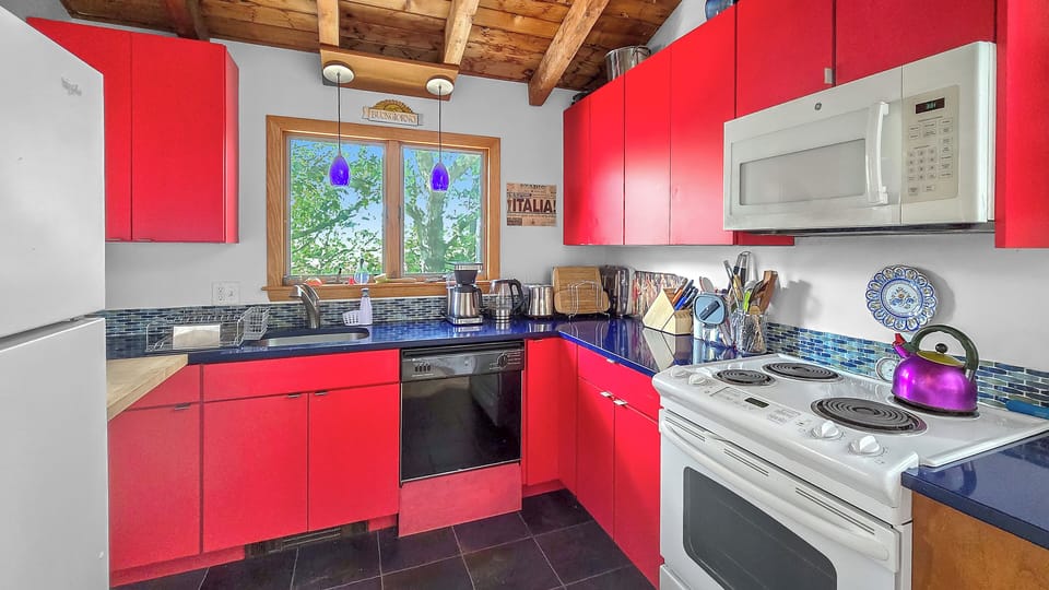 Nicely equipped kitchen off dining room