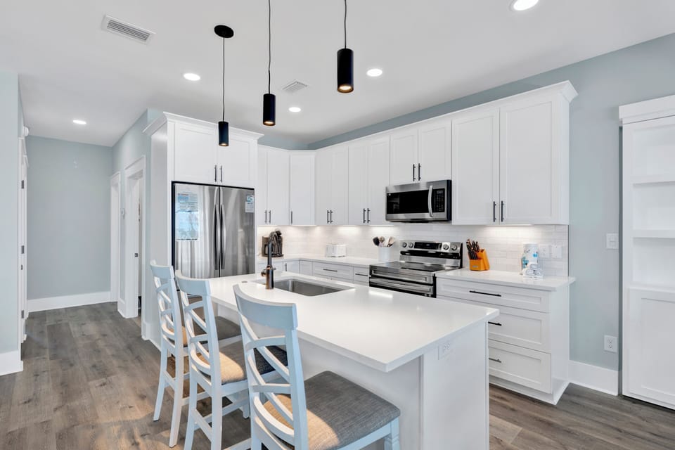 The kitchen is fully equipped and provides bar seating