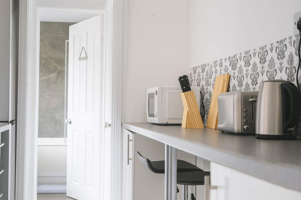 A fully equipped kitchen designed for cooking, gathering, and creating delicious meals