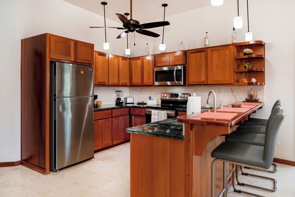 Kitchen and breakfast bar with seating