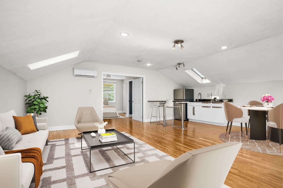 Bright open living room with kitchenette
