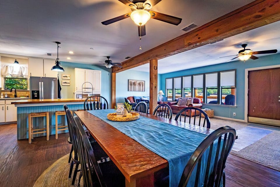 Dining table overlooking the living room and kitchen