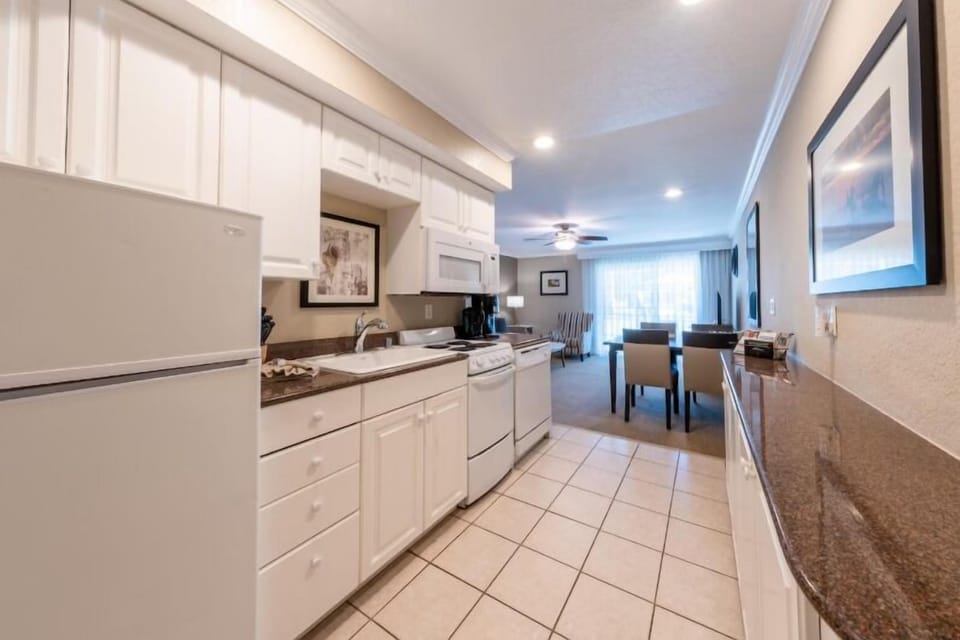 Cook with ease in the open kitchen with ample counters.