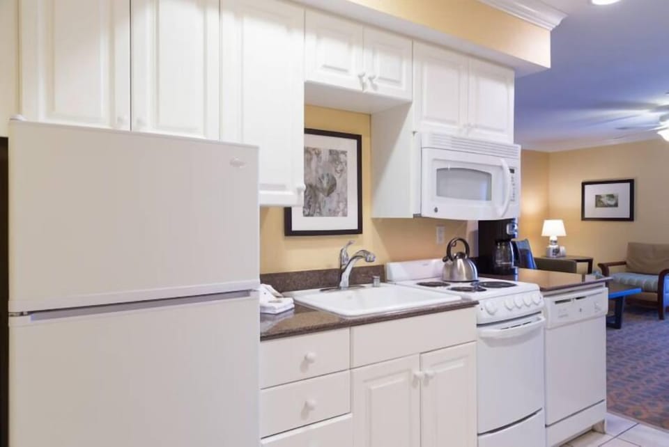 Start the day with breakfast prep in this bright kitchenette area.