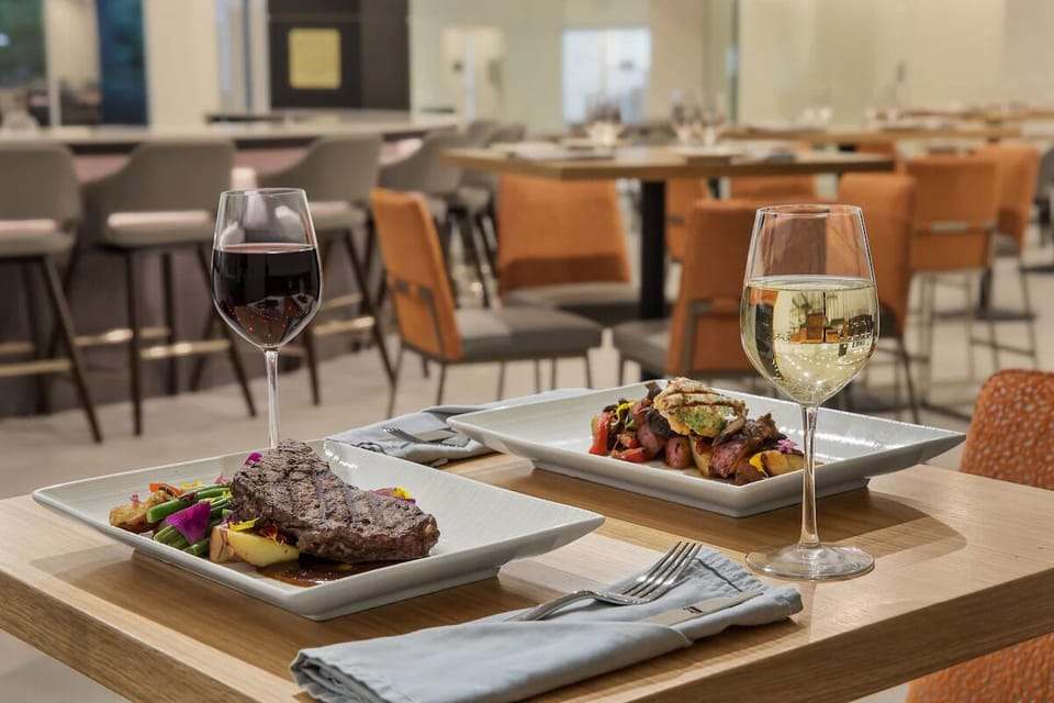 Savor a relaxed dinner with wine in the inviting restaurant.