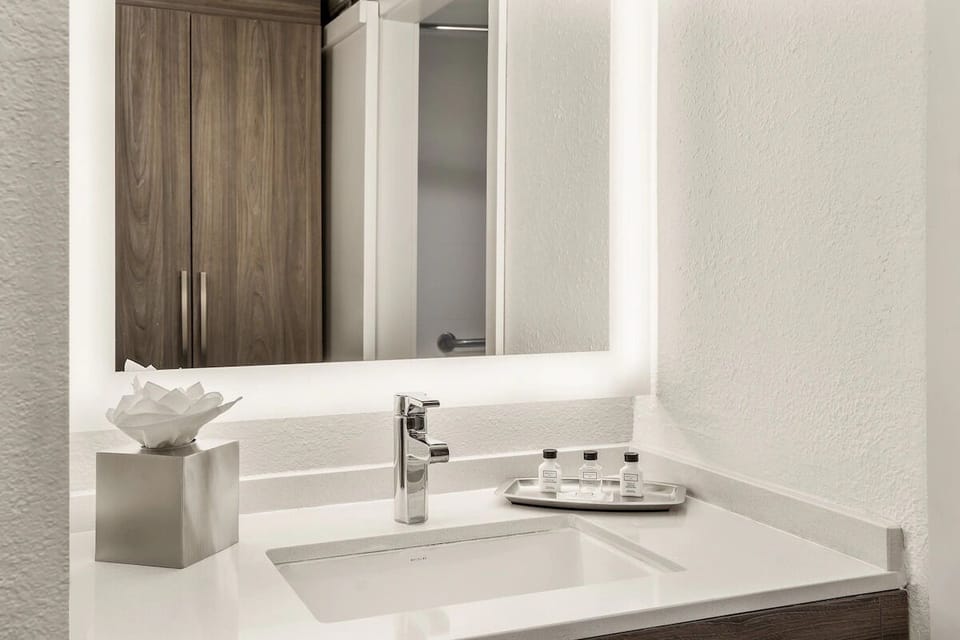Start the day with premium toiletries at a modern sink.