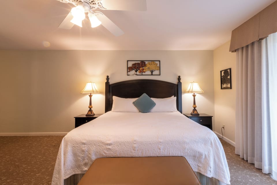Sink into crisp linens and drift off under soft lighting.