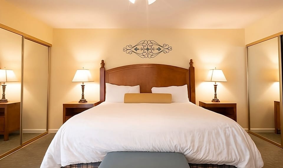 Sink into crisp linens and unwind in a serene king bed.