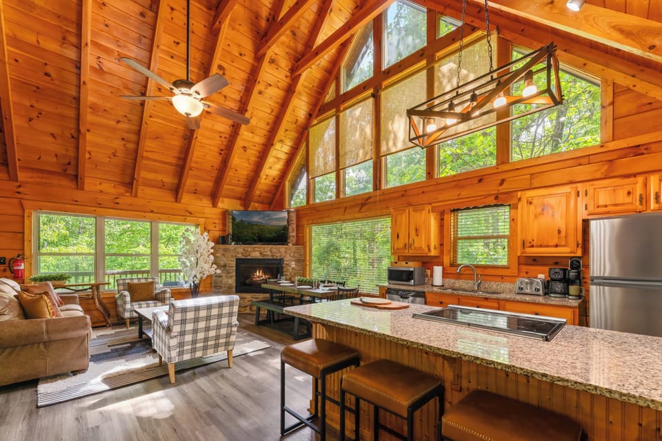 Vaulted living room with electric fireplace