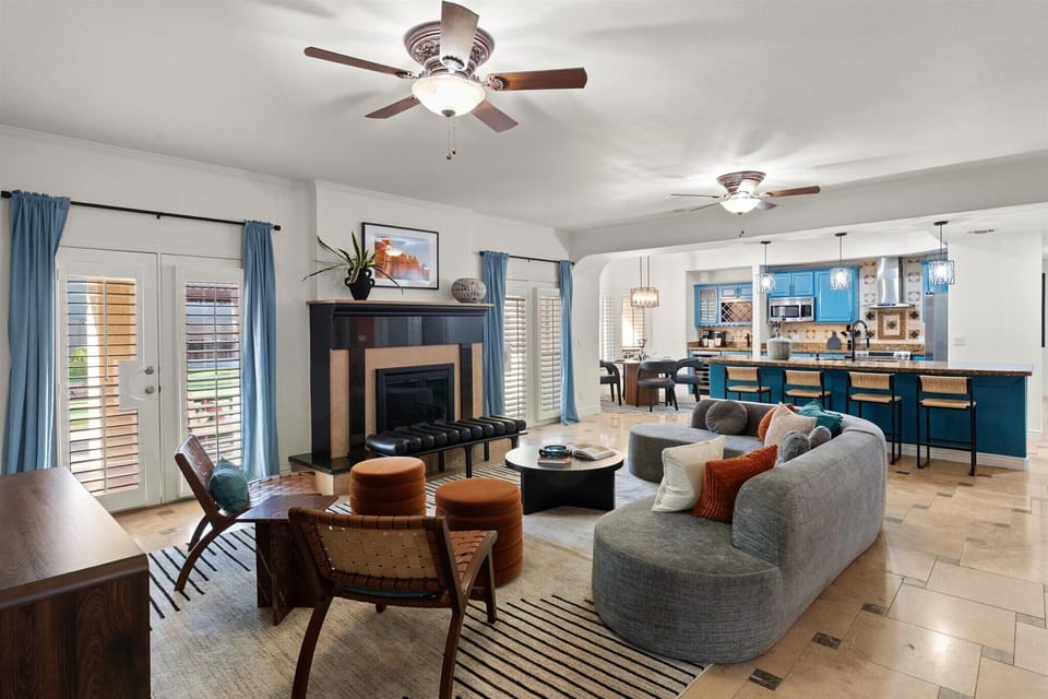Sit Back & Relax – A warm and welcoming living area with plush seating and a cozy atmosphere.
