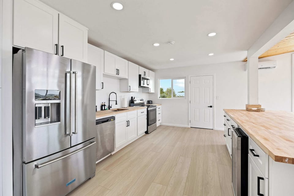 Fully equipped kitchen ready for your stay 🌿