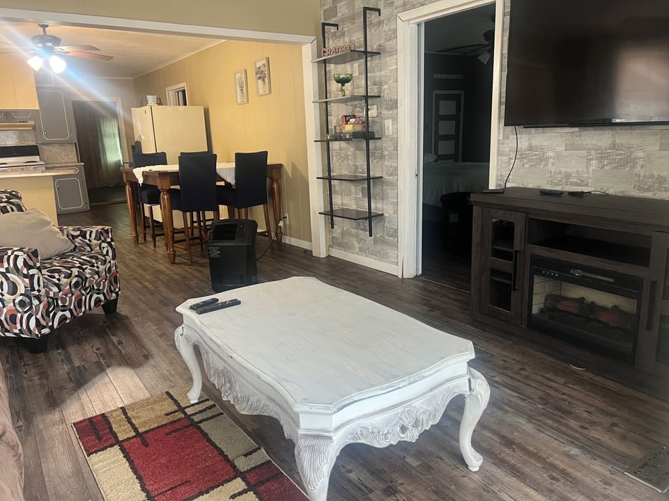 Living room view of dining area & kitchen