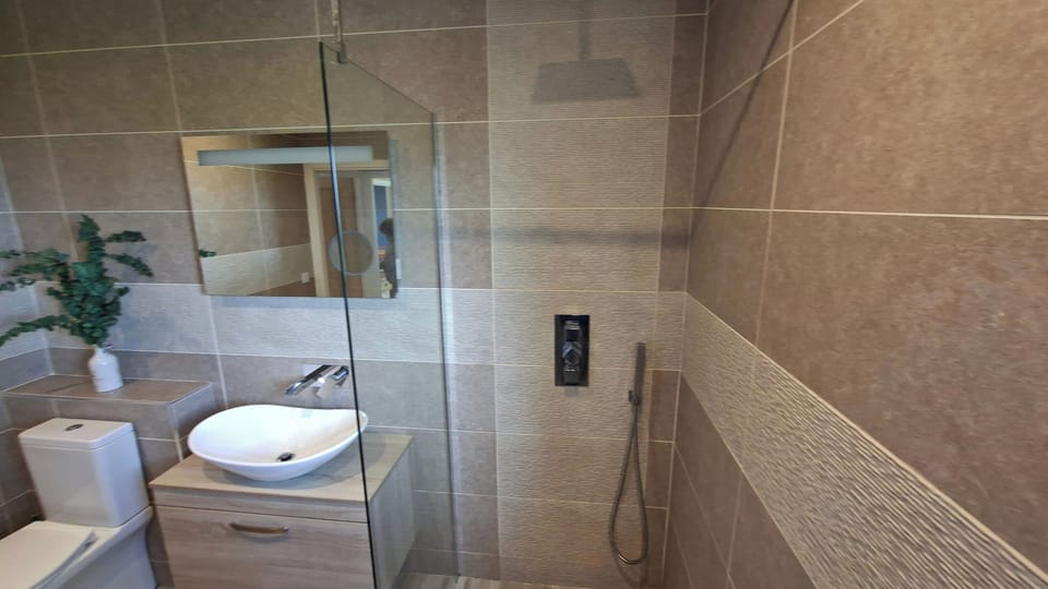 Wetroom bathroom, with heated towel rail  and underfloor heating