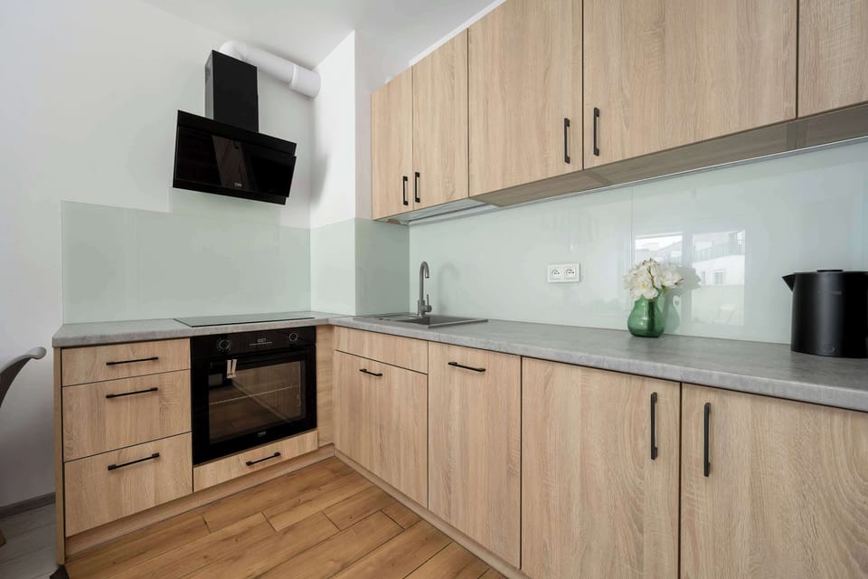 The kitchenette's practical layout maximizes space and functionality.
