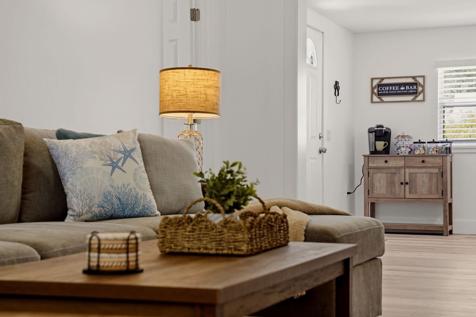 Cozy sectional styled with soft pillows and throws, perfect for lounging.