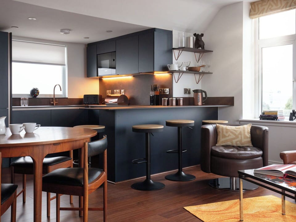 Furniture, Interior Design, Wood, Chair, Flooring, Light Fixture, Cabinetry, Lighting, Countertop, Table