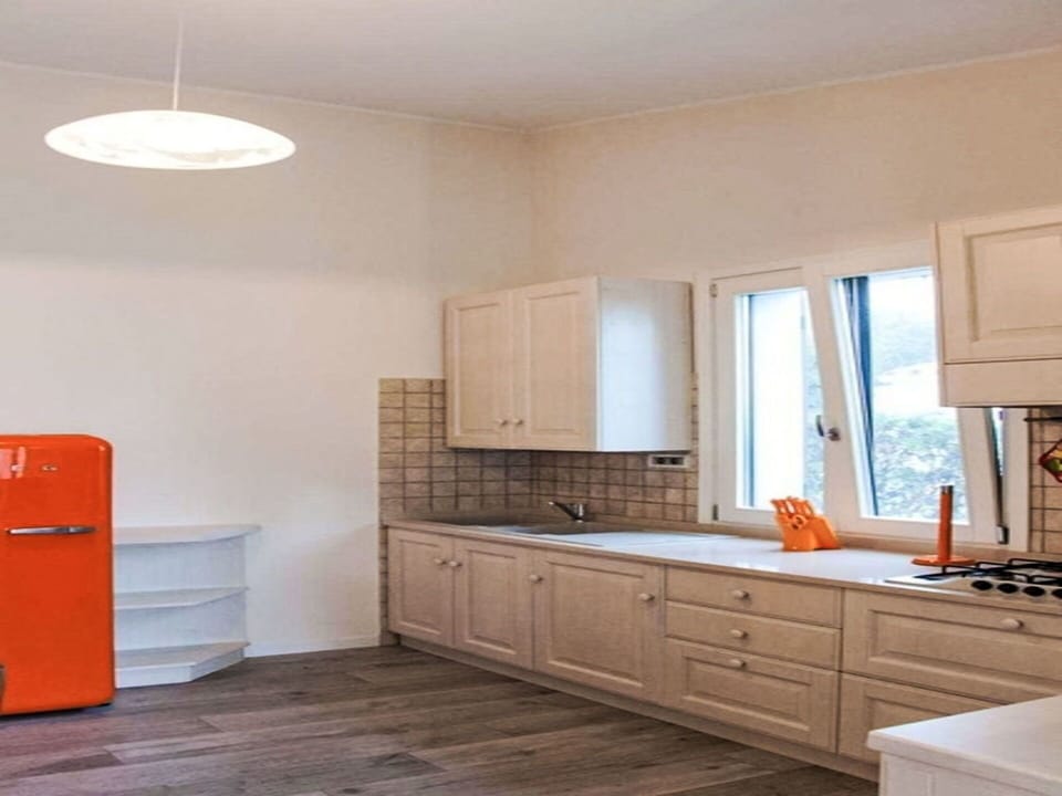 Interior Design, Flooring, Furniture, Kitchen, Wall, Countertop, Wood, Kitchen Appliance, Cabinetry, Floor