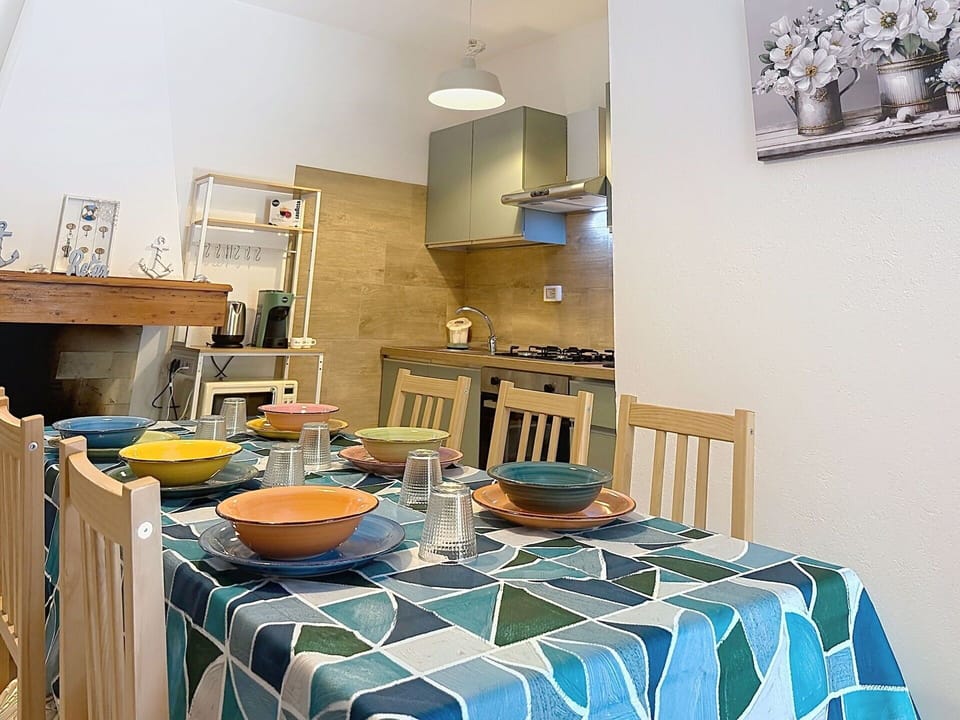 Furniture, Interior Design, Flooring, Wood, Floor, Room, Ceiling, Lighting, Chair, Kitchen & Dining Room Table