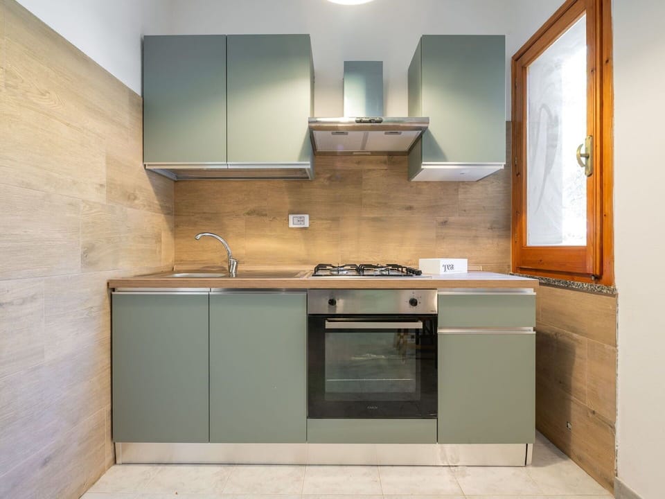 Kitchen, Kitchen Appliance, Major Appliance, Countertop, Cabinetry, Flooring, Wood, Interior Design, Home Appliance, Kitchen Stove