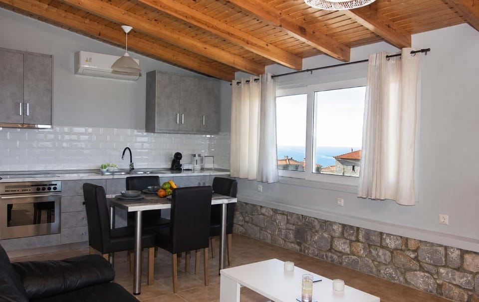 Bright open-plan living area with beautiful sea views.