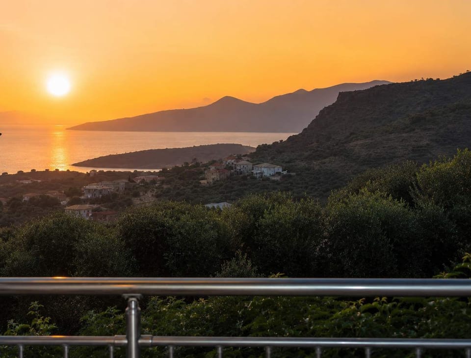 Spectacular sunset views over the sea and surrounding hills.