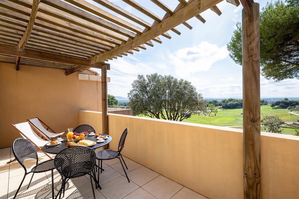 Al fresco dining with views of the Provençal countryside — the perfect end to any day.