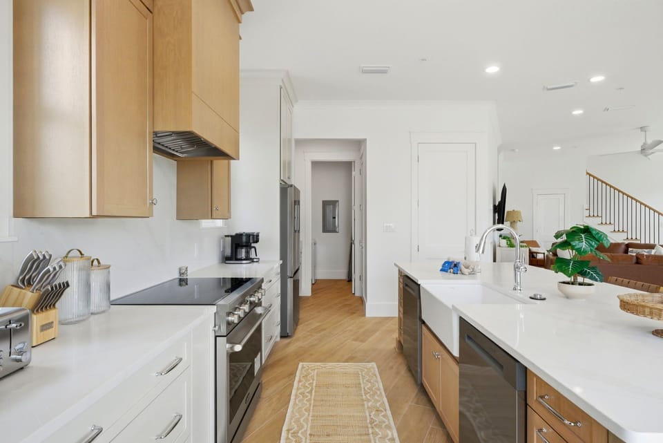 Kitchen with double refrigerators & dishwashers