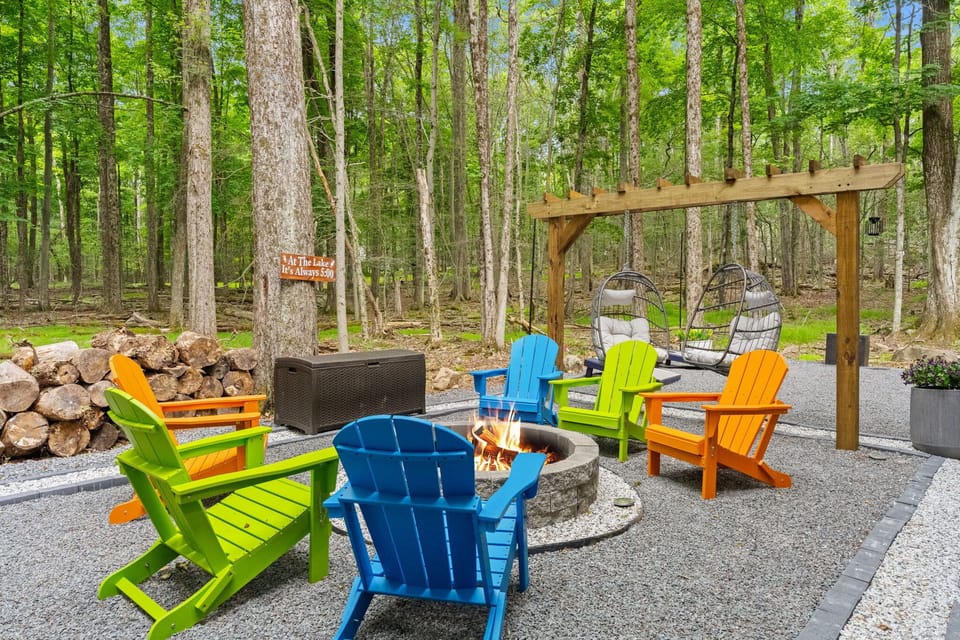 Charming pergola patio with colorful seating and vibrant flower accents