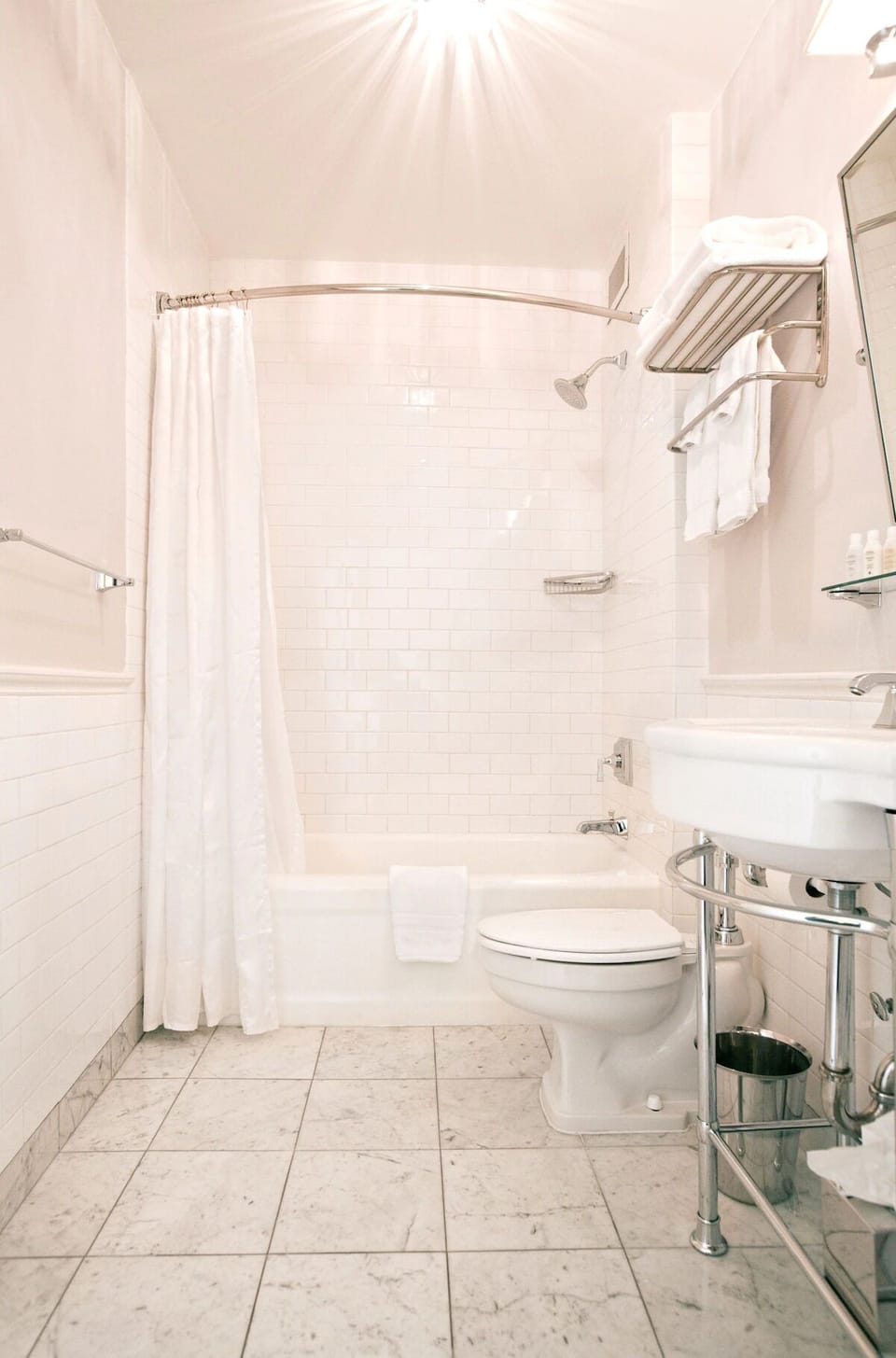 Refresh in a spotless bathroom with bright, spa-clean finishes.