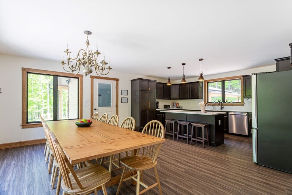 Spacious open-concept kitchen and dining area perfect for groups
