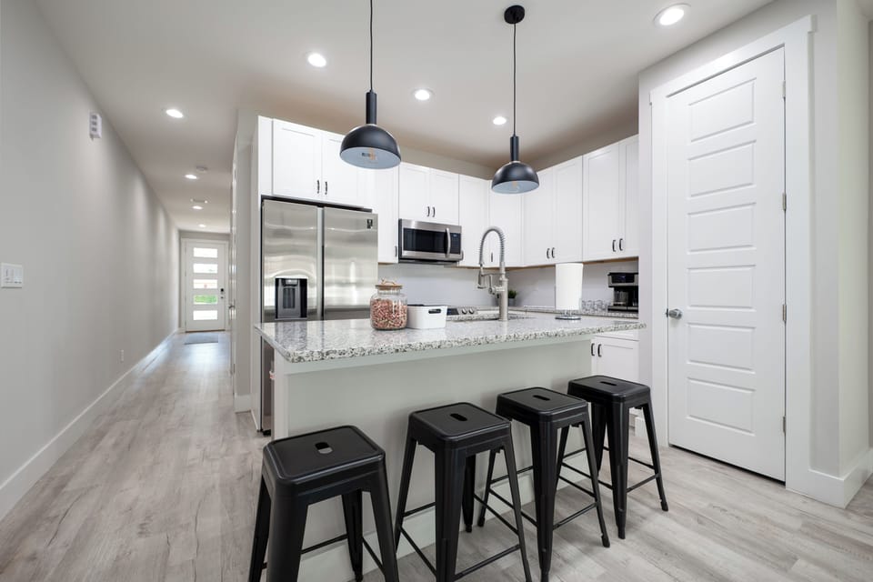 The kitchen bar is great for enjoying a wonderful meal.