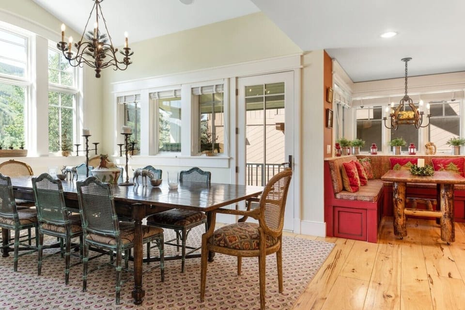 Large dining room with fireplace and views