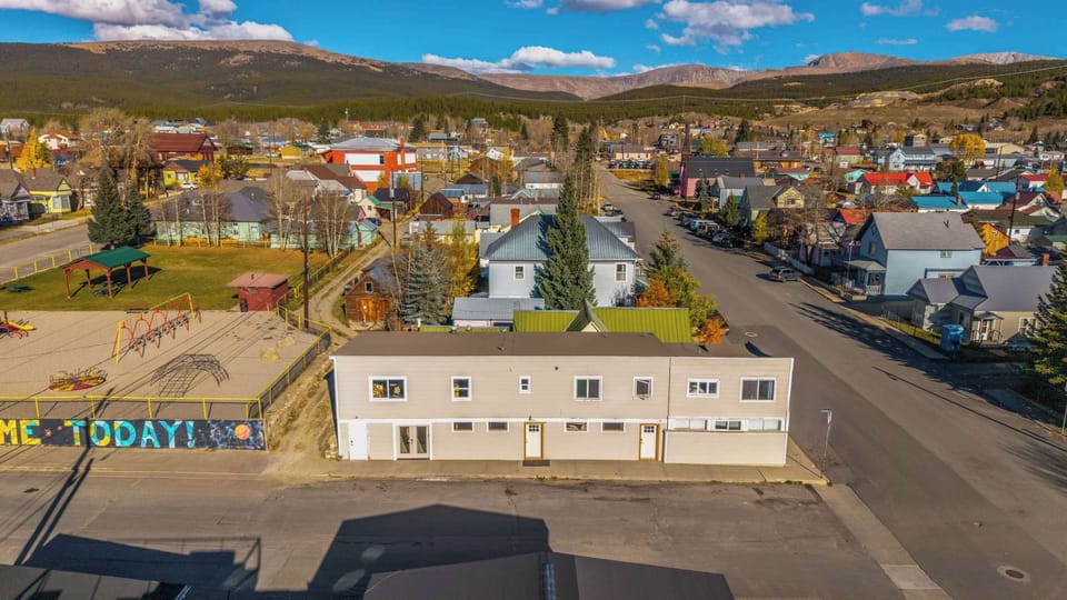 【Aerial】 Your building, the park next door, and the Sawatch Range — all on the same block