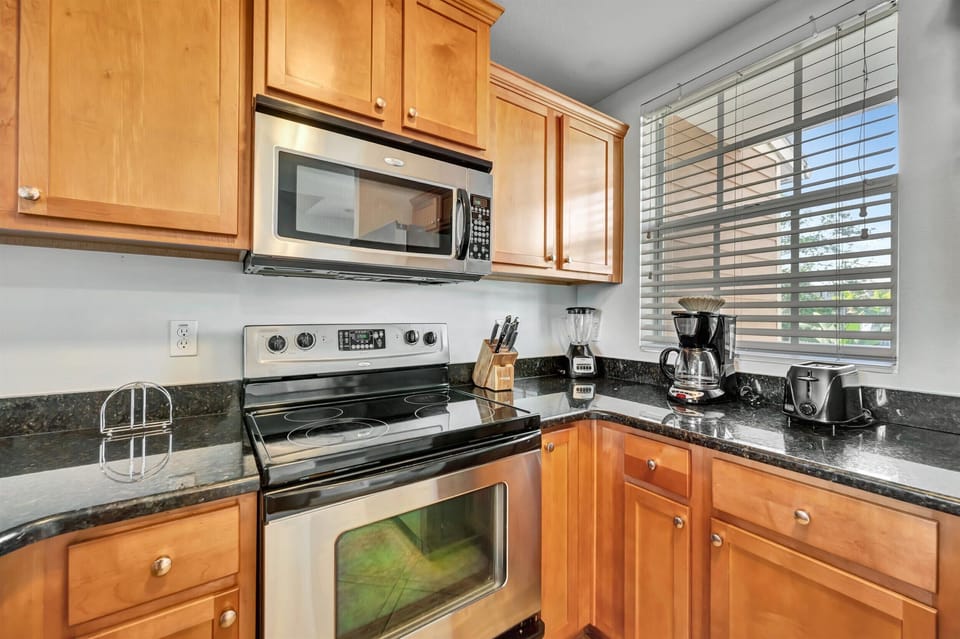Kitchen with coffee maker and prep space