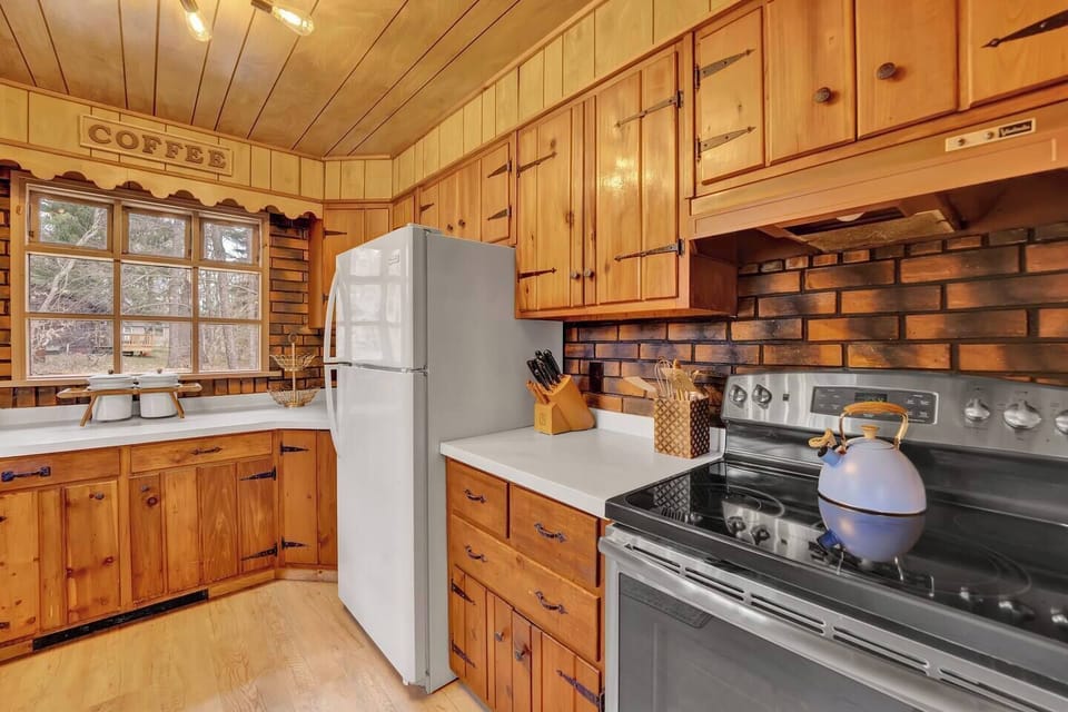 Modern appliances and ample counter space make cooking easy and convenient.