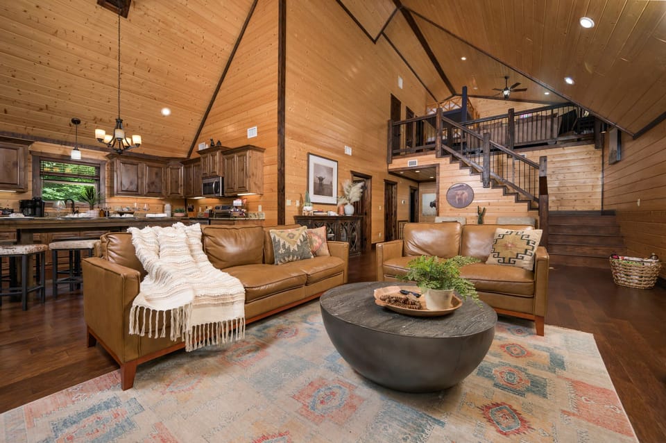 Soaring wood ceilings and a cozy open living space with rustic charm