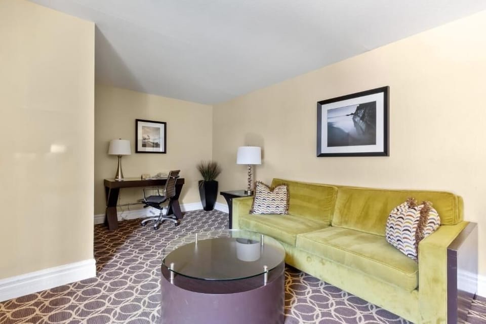 Lounge and recharge with cozy seating and a quiet desk.