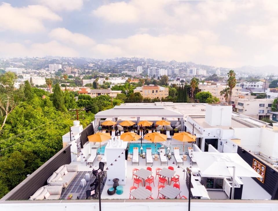 Step onto a showstopping rooftop retreat with panoramic city energy.