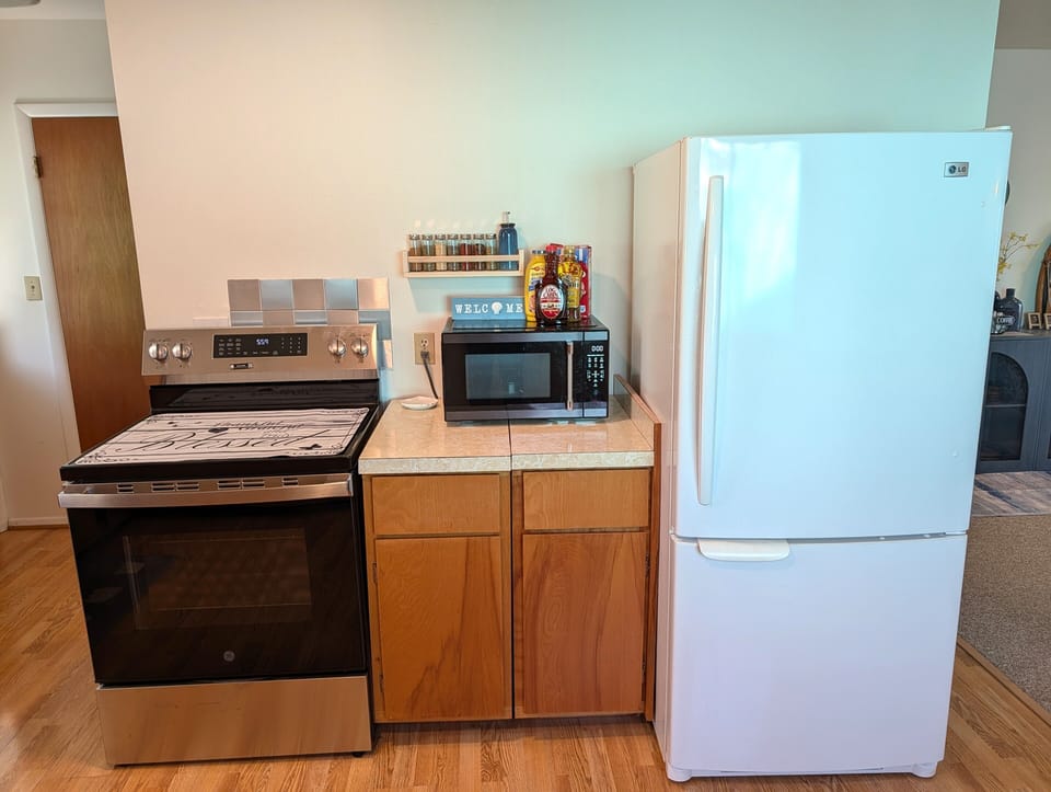 KITCHEN (MAIN FLOOR):  Modern kitchen with all appliances except for a dishwasher.