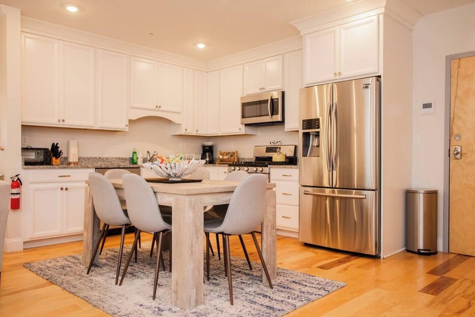 Dining Table, Seats 6 people comfortably, and is in the middle of cooking space making it easy to get dinner on the table
