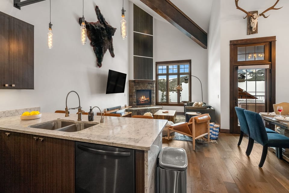 Kitchen: Drip coffee maker, Keurig coffee machine, blender, toaster oven, tableware, main floor
