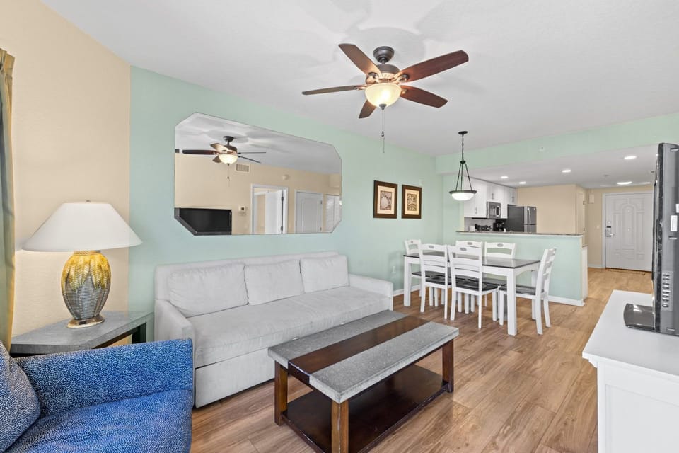 Relax in this bright living area, perfect for unwinding after a day at the beach.
